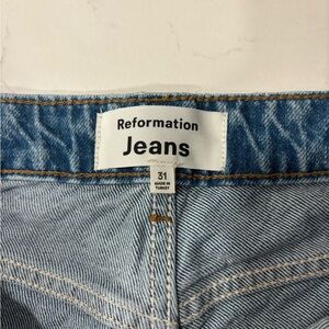 Reformation Light Blue Denim Jeans with Gold Stitching